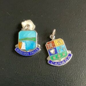 Vintage sterling travel charms Canada and Niagara Falls.